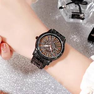 Luxuriöse GEDI Damen Uhr in Schwarz mit Kristalllünette und Stahlarmband
