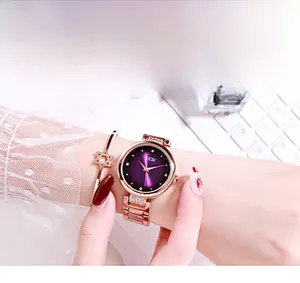 Orologio al quarzo oro rosa con quadrante viola e bracciale a stella coordinato