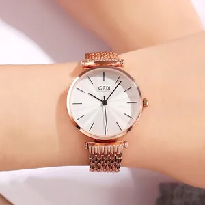 Elegant rose gold minimalist women's watch with white dial and Milanese mesh steel band