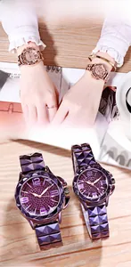 Detail of rose gold diamond quartz watch with geometric strap and matching bracelet