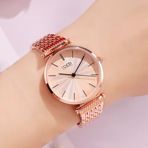 GEDI women's quartz watch with rose gold mesh strap and sunray textured dial on wrist