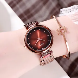 Set orologio da donna oro rosa con quadrante marrone sfumato e bracciale a stella