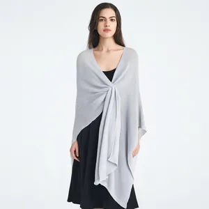 Elegant light grey knitted shawl wrap for women with front cross knot and draped fold detail