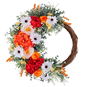 Artificial floral rose wreath with grapevine base for festive home and wedding decor