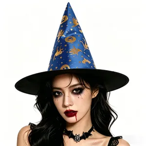 Detailed view of blue satin witch hat with gold stars and moon foil printing patterns