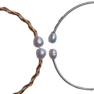 Handmade wire-wrapped freshwater pearl bracelets in gold and silver adjustable designs