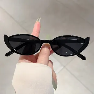 Retro black narrow cat-eye sunglasses with glossy finish and dark lenses for women