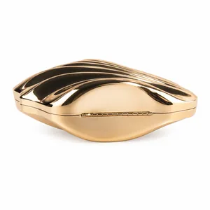 Golden shell-shaped evening clutch bag with glossy metallic finish for weddings