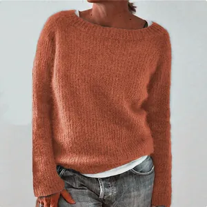 Detailed view of women's casual burnt orange solid color knit sweater with long sleeves