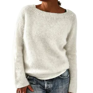 Detailed view of a cozy white fuzzy knitted sweater for women on a studio model