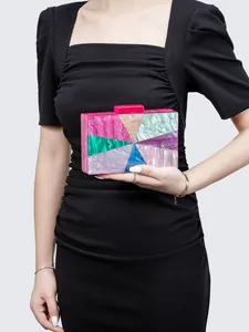 Detail view of colorful acrylic marble texture panels on a stylish evening clutch bag