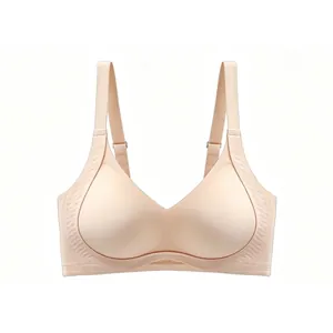 Detailed view of wide shoulder straps and wave textures on a seamless nude bra