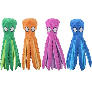 Detailed macro view of four colorful octopus squeaky toys with textured nubby plush fabric