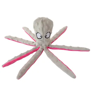 Detail of plush octopus toy for dogs with grey textured fabric and pink tentacles