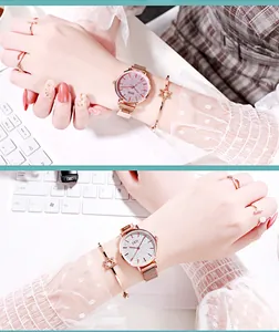 Close-up of GEDI women's quartz watch with star dial and rose gold magnetic mesh strap