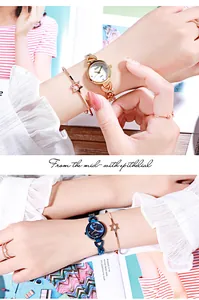 Gros plan d'une montre à quartz élégante avec bracelet assorti orné d'une étoile