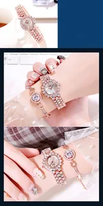 Close-up of rose gold watch set with crystal-studded bracelet in a lifestyle setting