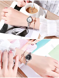 Vue détaillée d'un coffret montre GEDI avec bracelet étoile et bague en diamant sur table