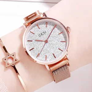 Elegant rose gold women's watch with gradient starry dial and Milanese mesh band
