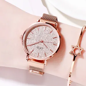Rose gold mesh band watch with sparkling gradient dial and star bracelet set
