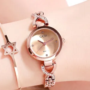 Montre à Quartz pour Femme à la Mode avec Strass Petit Cadran Rond Or Rose Bracelet en Chaîne d'Acier Inoxydable Élégant