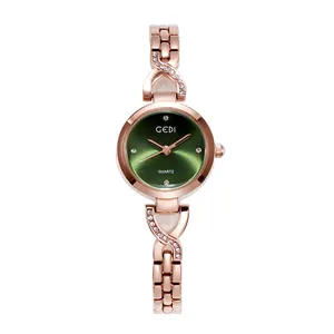 Montre à quartz élégante pour femme en or rose avec cadran vert et diamants