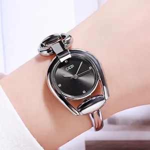 Elegant GEDI women's silver bangle watch with horseshoe case and black rhinestone dial