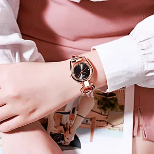 Elegant rose gold bracelet watch for women featuring a black dial and GEDI branding