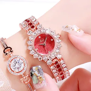 Elegantes Damenuhr-Set in Roségold mit roten Kristallen und funkelnden Diamanten