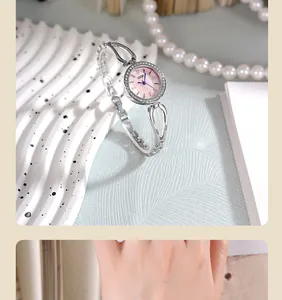 Close-up of women's GEDI quartz watch with pink dial and sparkling rhinestone bezel