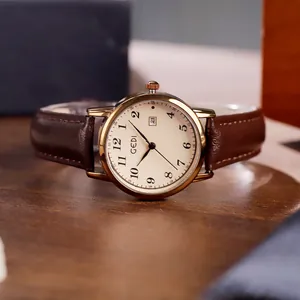 GEDI Women Retro Korean Style Round Quartz Watch Alloy Case Leather Strap Date Window Water Resistant Lady Wristwatch