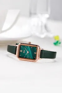 Detail of vintage rectangular quartz watch with green malachite dial and rose gold case