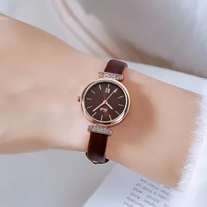 Women's quartz watch with brown leather strap, rose gold case, and diamond accents