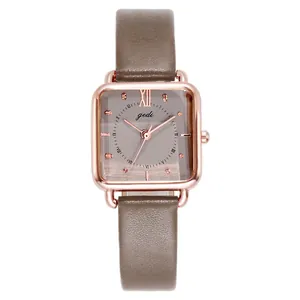 Reloj vintage cuadrado de oro rosa para mujer con esfera gris y correa de cuero marrón