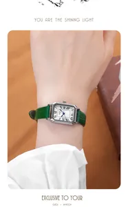 Close-up of GEDI vintage square watch with green leather strap on female wrist