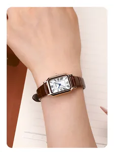 Detail of GEDI rectangular vintage watch with brown leather strap worn on wrist