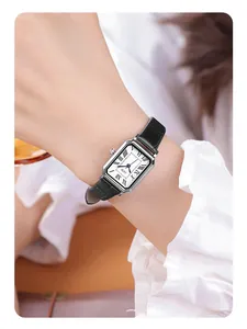Close-up of GEDI vintage rectangular watch with Roman numerals on a model wrist