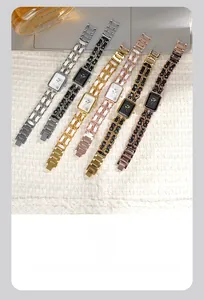 Close-up of elegant square quartz watches featuring classic leather chain link straps