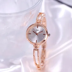 Elegant rose gold women's quartz watch with minimalist dial and mesh alloy bracelet