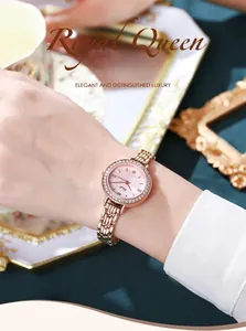 Elegant rose gold watch with crystal bezel worn on wrist during a royal tea scene