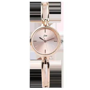 Elegant rose gold minimalist round quartz watch with stylish bangle bracelet for women