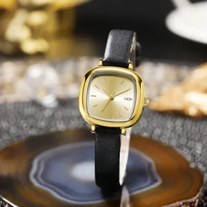 Elegante goldene quadratische Damenuhr mit schwarzem Lederarmband und Champagner-Zifferblatt