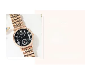 Detail of GEDI rose gold stainless steel watch with black dial and Roman numerals