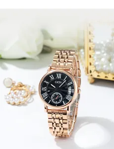 Detailed close-up of GEDI rose gold watch with black dial and Roman numerals on display