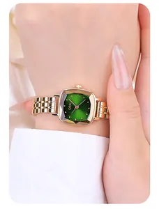 Detail view of GEDI luxury square watch with green dial and gold stainless steel strap