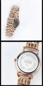 Detail view of rose gold stainless steel watch band and engraved waterproof case back