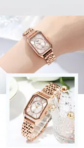Details einer roségoldenen achteckigen Quarzuhr mit Diamantlünette und Datumsanzeige