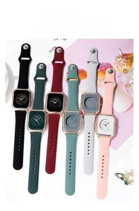 Detailed flat lay of trendy square dial quartz watches with colorful silicone straps