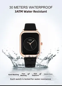 Detail view of GEDI square waterproof quartz watch with splashes highlighting its 3ATM water resistance