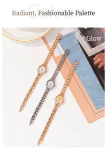 Detailed view of chic quartz watches with small round dials and wavy metal link bracelets